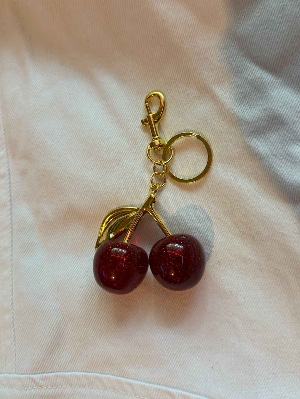 red and gold cherry keychain